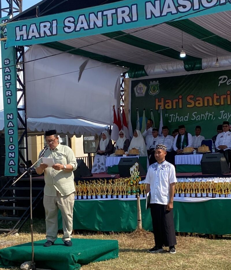 Staf Ahli Bupati Pinrang bidang kemasyarakatan dan SDM Kent Mukti Ali, SE.,M.Si membacakan sambutan Bupati Pinrang